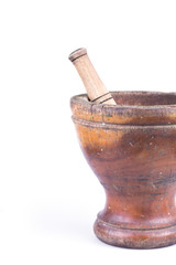 wooden mortar and pestle isolated on white background