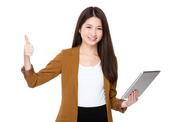 Young woman hold with tablet and thumb up