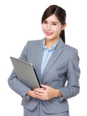 Young Asian Businesswoman hold with laptop computer