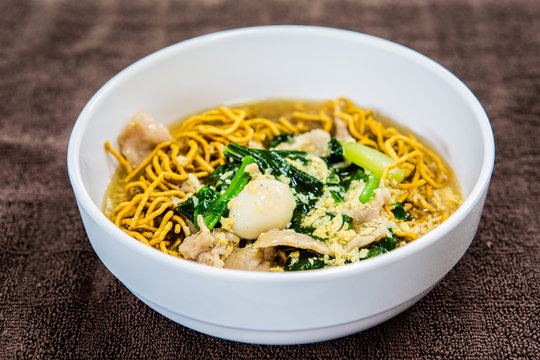Thai noodle on white bowl