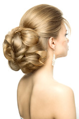 Fototapeta premium Portrait of the bride with beautiful hairstyle on white