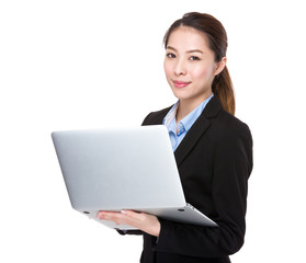 Businesswoman use of the laptop computer