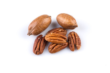 Few pecan nuts isolated on white