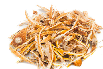 Closeup of dried lemon citrus peel in white background
