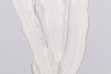 Paint brush stroke over the white paper