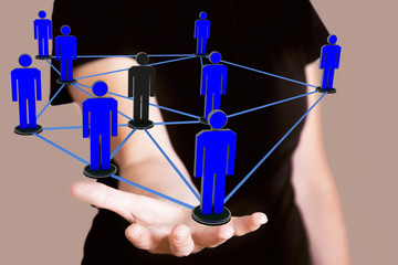 Woman holding network with human figures