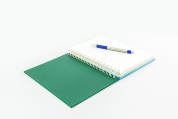 green book with pen.