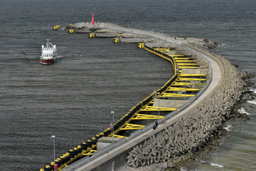 Coastline with concrete wave breaker.Baltic Sea