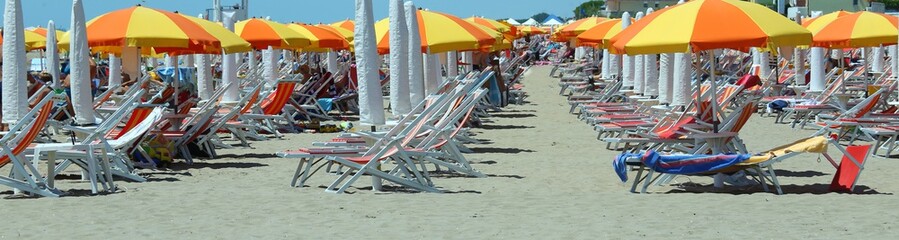 colorful parasol on the beach during the hot summer