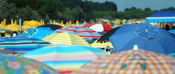 colorful parasol on the beach during the hot summer © ChiccoDodiFC