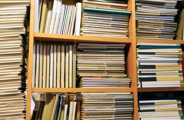 many books piled up for sale in the great library