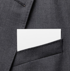 Business card in suit pocket