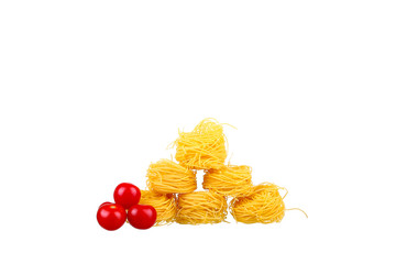 row dry nest pasta on white and cherry