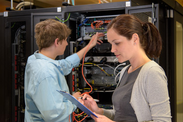 Team of IT specialists in datacenter