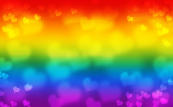 Flag of Gay Pride movement with bokeh hearts effect.