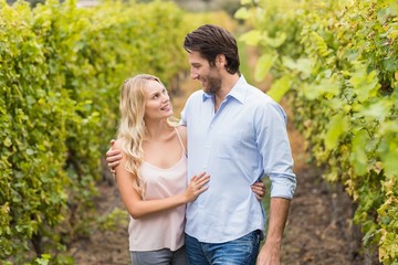 Fototapeta premium Young happy couple embracing each other