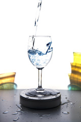 Water is poured into a glass
