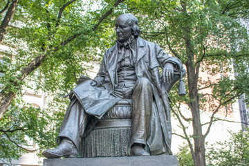 Fototapeta na wymiar bronze statue of Horace Greeley at City Hall Park Manhattan New York City