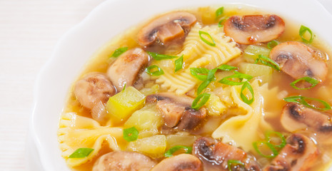 mushroom soup with pasta and vegetables
