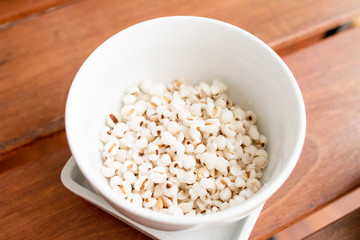 Variety of cereals in white bowl