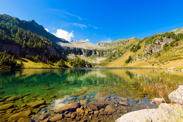 Fototapeta premium Lago di Campo - Adamello Trento Italy. Lago di Campo (Campo lake) 1944 m. Small beautiful alpine lake in the National Park of Adamello Brenta, Trentino Alto Adige, Italy