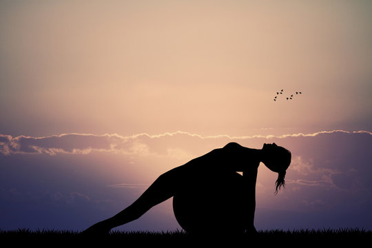 pilates silhouette at sunset