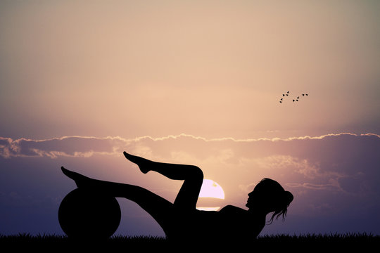 pilates silhouette at sunset