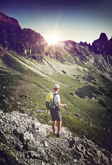 Fototapeta premium Rear view of male hiker during trekking