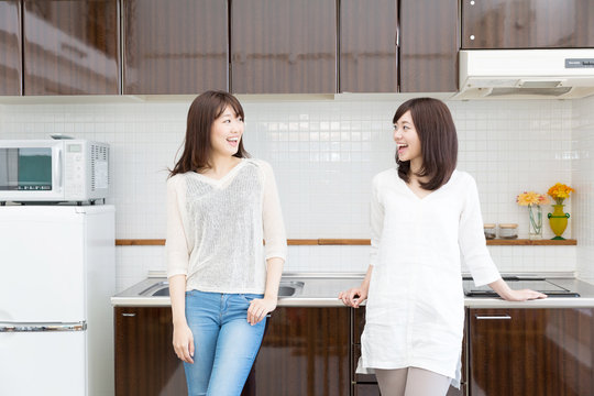 young asian women kitchen image
