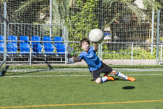 Boy Playing Soccer Goalie