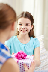happy little girls with birthday present at home © Syda Productions