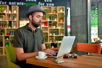 Young Man working on Laptop