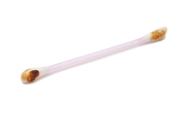 Ear wax on cotton swab isolated on white background