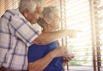 Elder couple having a coffee break
