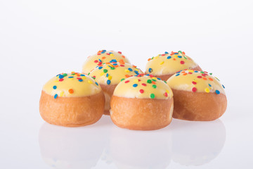 Sweet mini donut on background