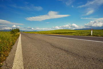 asphalt road in Tuscany hills,  Italy