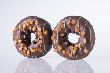 chocolate donuts on a white background
