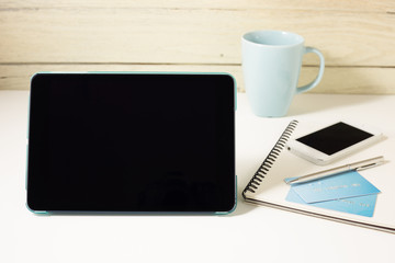 Tablet and credit card with smartphone