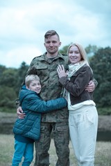 Soldier and happy family