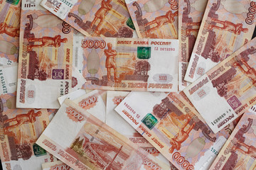 Many russian roubles at the table