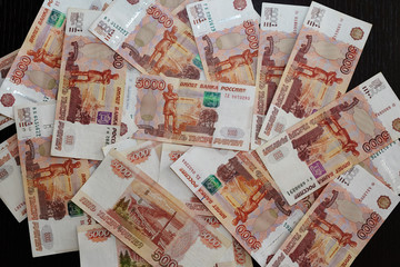Many russian roubles at the table