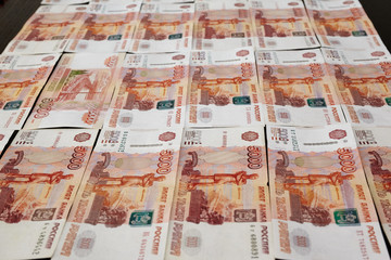 Many russian roubles at the table