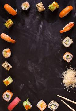 Sushi set on dark background. Minimalism