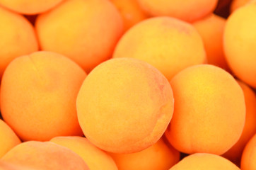 Ripe apricot close up, DOF, as background