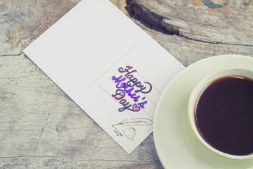 Mother's Day card written on an old wooden concept of Mother's Day.