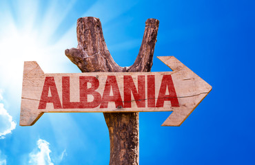 Albania wooden sign with sky background