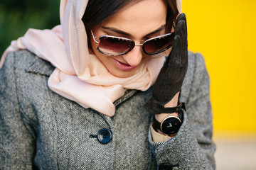 beautiful girl sitting on a bench in the park