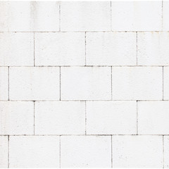 The modern white concrete tile wall background and texture..