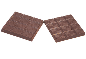 Broken milk chocolate bar isolated on white background