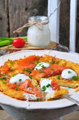 potato pancakes with sour cream and smoked salmon